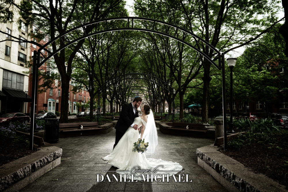 Couple under arched sign
